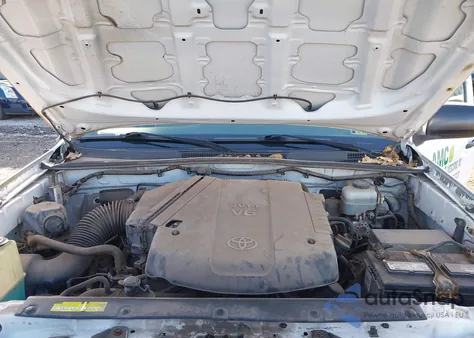 2013 Toyota Tacoma Base V6 z USA, uszkodzony, nr VIN 3TMLU4EN0DM112149